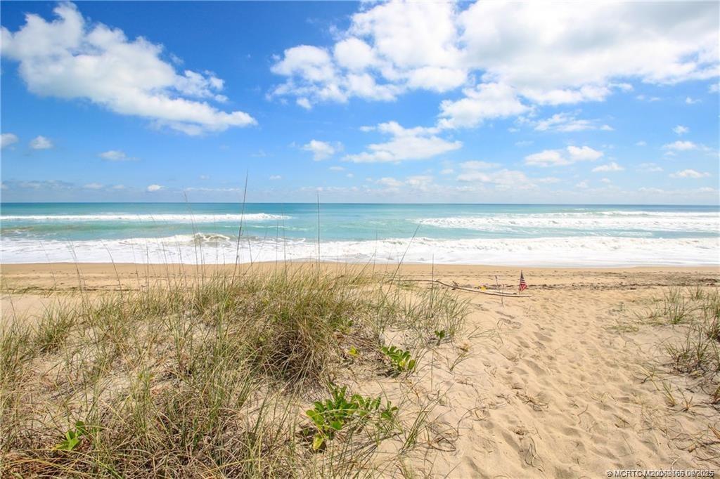 2491 Northeast Ocean Boulevard, Unit 302 Stuart, FL 34996 - Photo 27 of 35 a view of an ocean and beach