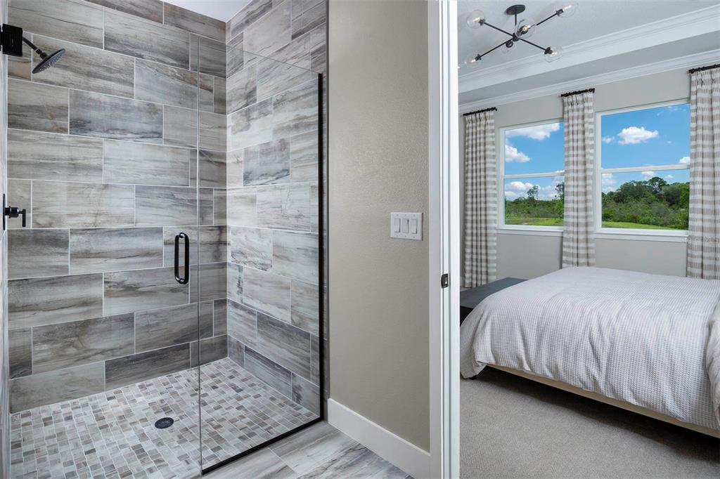 17787 Stillness Court Venice, FL 34293 - Photo 15 of 36 a bedroom with a bed and a window