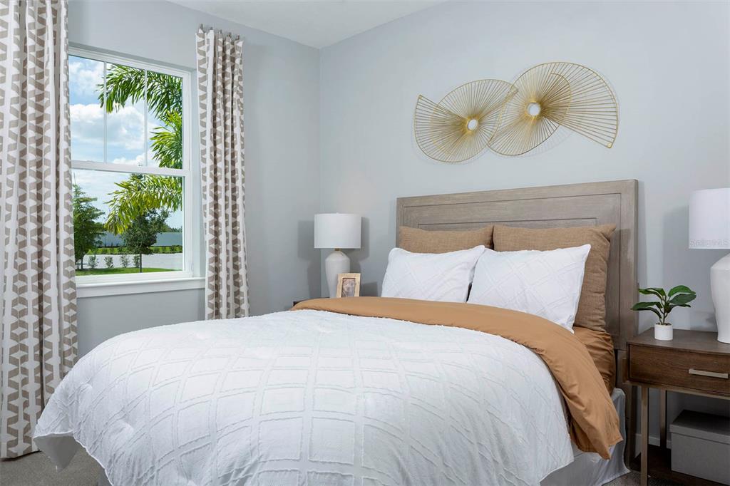 17787 Stillness Court Venice, FL 34293 - Photo 5 of 36 a bedroom with a bed and window