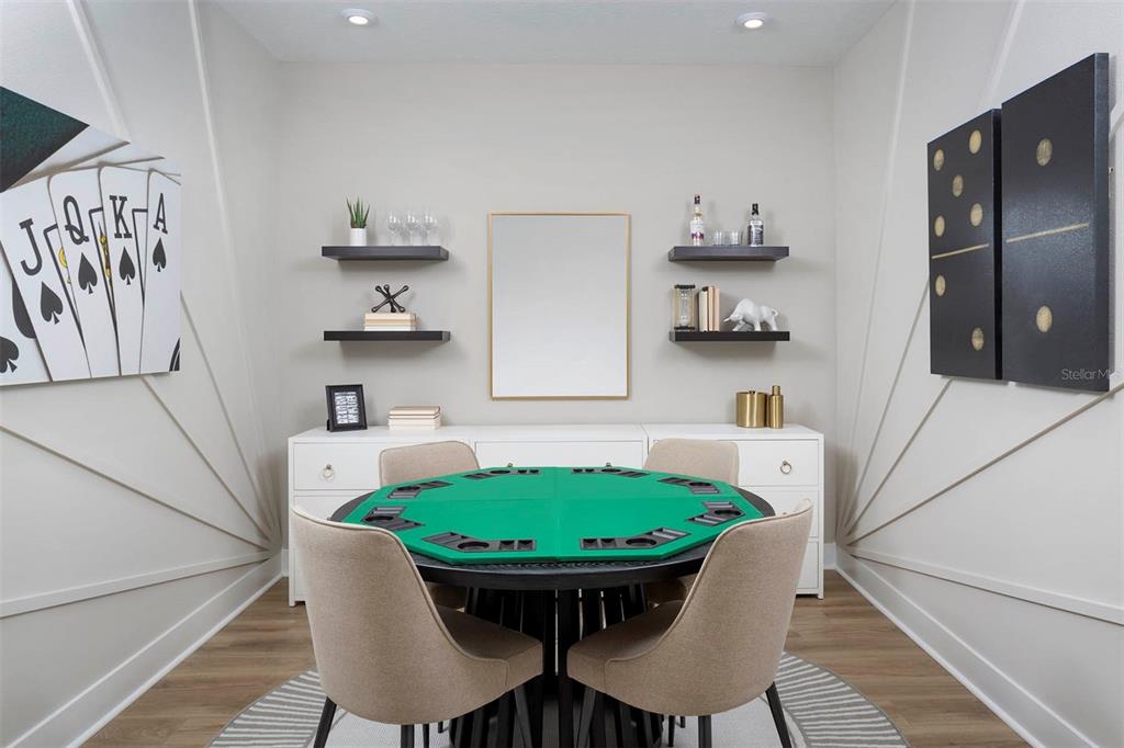 17787 Stillness Court Venice, FL 34293 - Photo 6 of 36 a view of a dining room with furniture