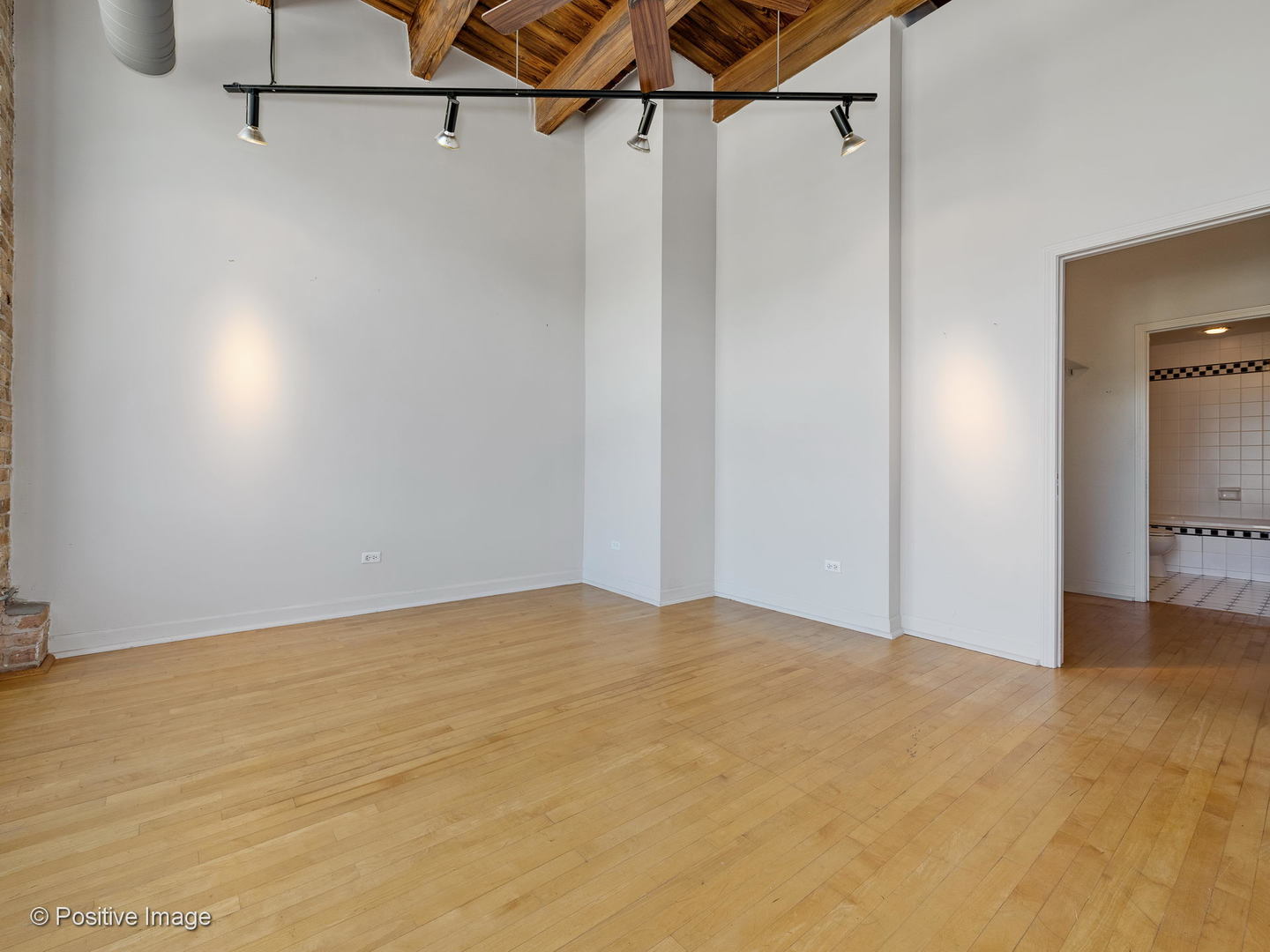 11 North Green Street, Unit 3CD Chicago, IL 60607 - Photo 17 of 40 a view of a room with racks on the wall