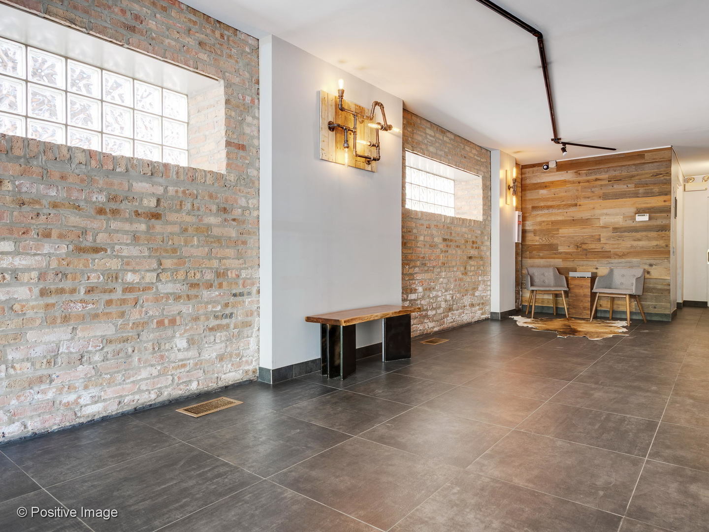 11 North Green Street, Unit 3CD Chicago, IL 60607 - Photo 22 of 40 a view of a livingroom with furniture and windows