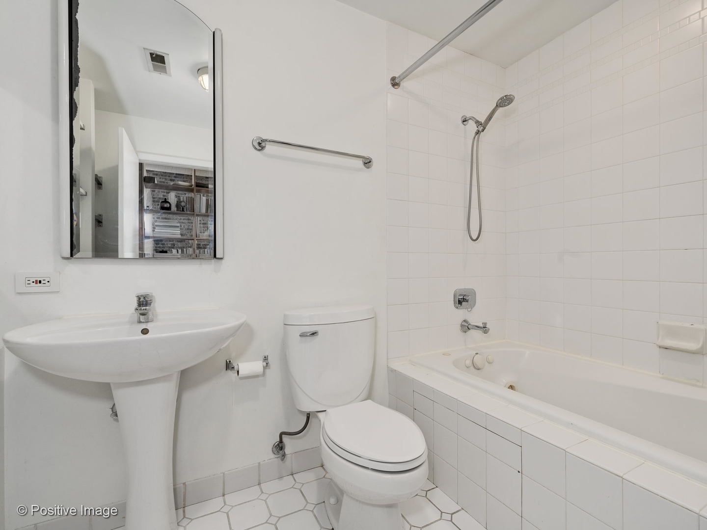 11 North Green Street, Unit 3CD Chicago, IL 60607 - Photo 35 of 40 a bathroom with a sink toilet and shower