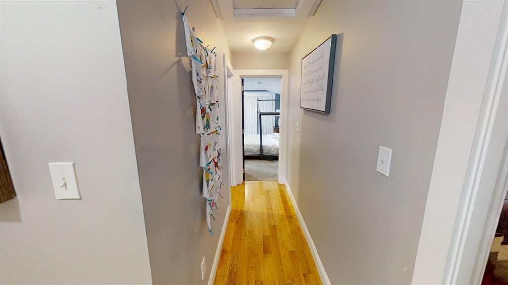 223 Old Common Road Lancaster, MA 01523 - Photo 15 of 31 a view of a hallway view with wooden floor and entryway