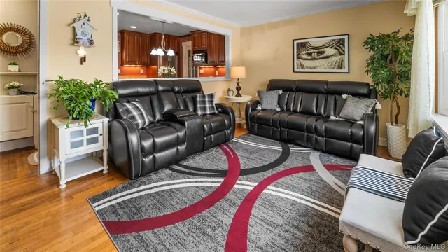 a backyard of a house with lots of green space and garden