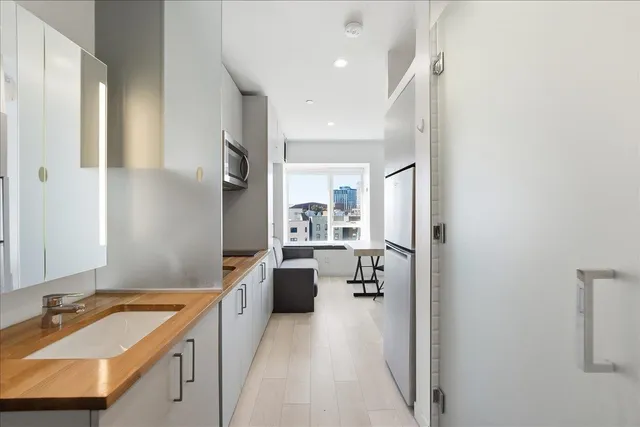 a spacious bathroom with a sink double vanity