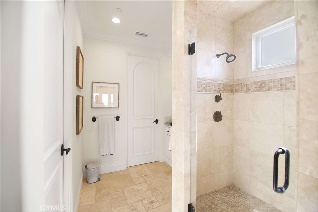 1015 Gardena Road Encinitas, CA 92024 - Photo 19 of 42 a bathroom with a granite countertop shower