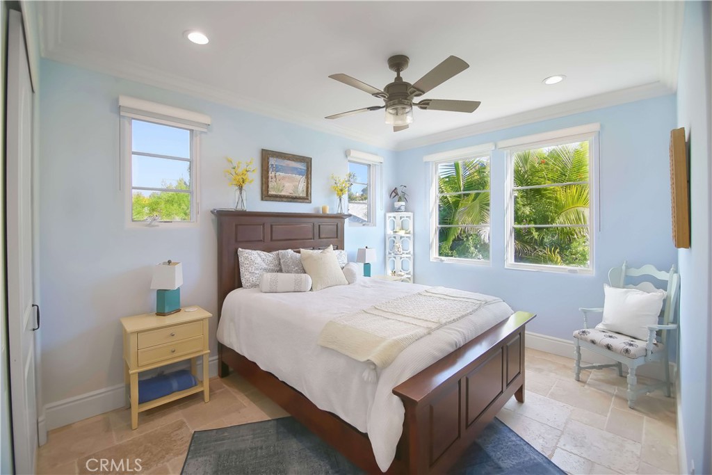 1015 Gardena Road Encinitas, CA 92024 - Photo 23 of 42 a bedroom with a large bed and a window
