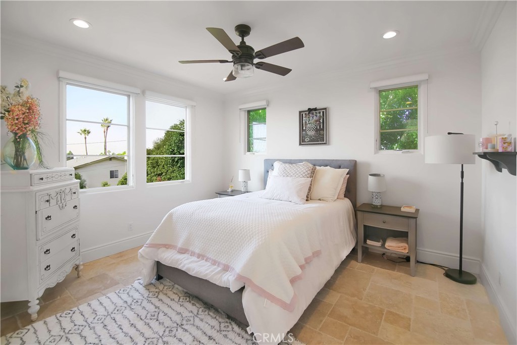 1015 Gardena Road Encinitas, CA 92024 - Photo 25 of 42 a bedroom with a large bed and a window