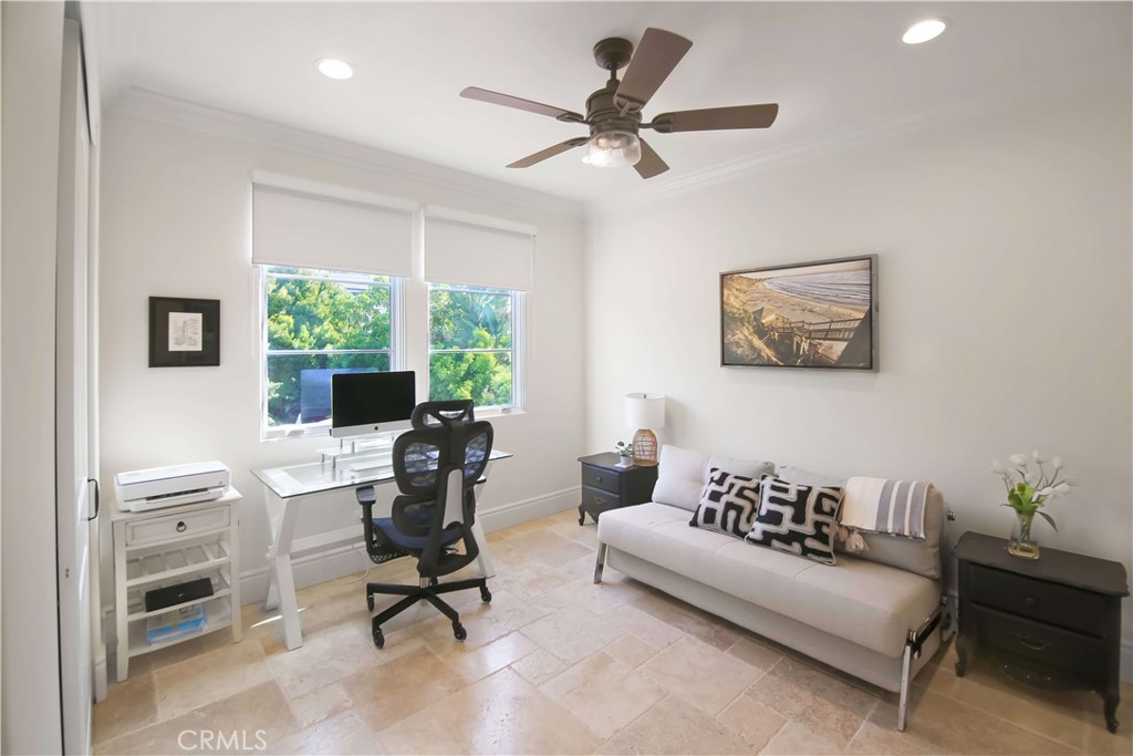 1015 Gardena Road Encinitas, CA 92024 - Photo 27 of 42 a view of a workspace with furniture and a window