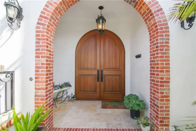 a view of a entryway door with wooden floor