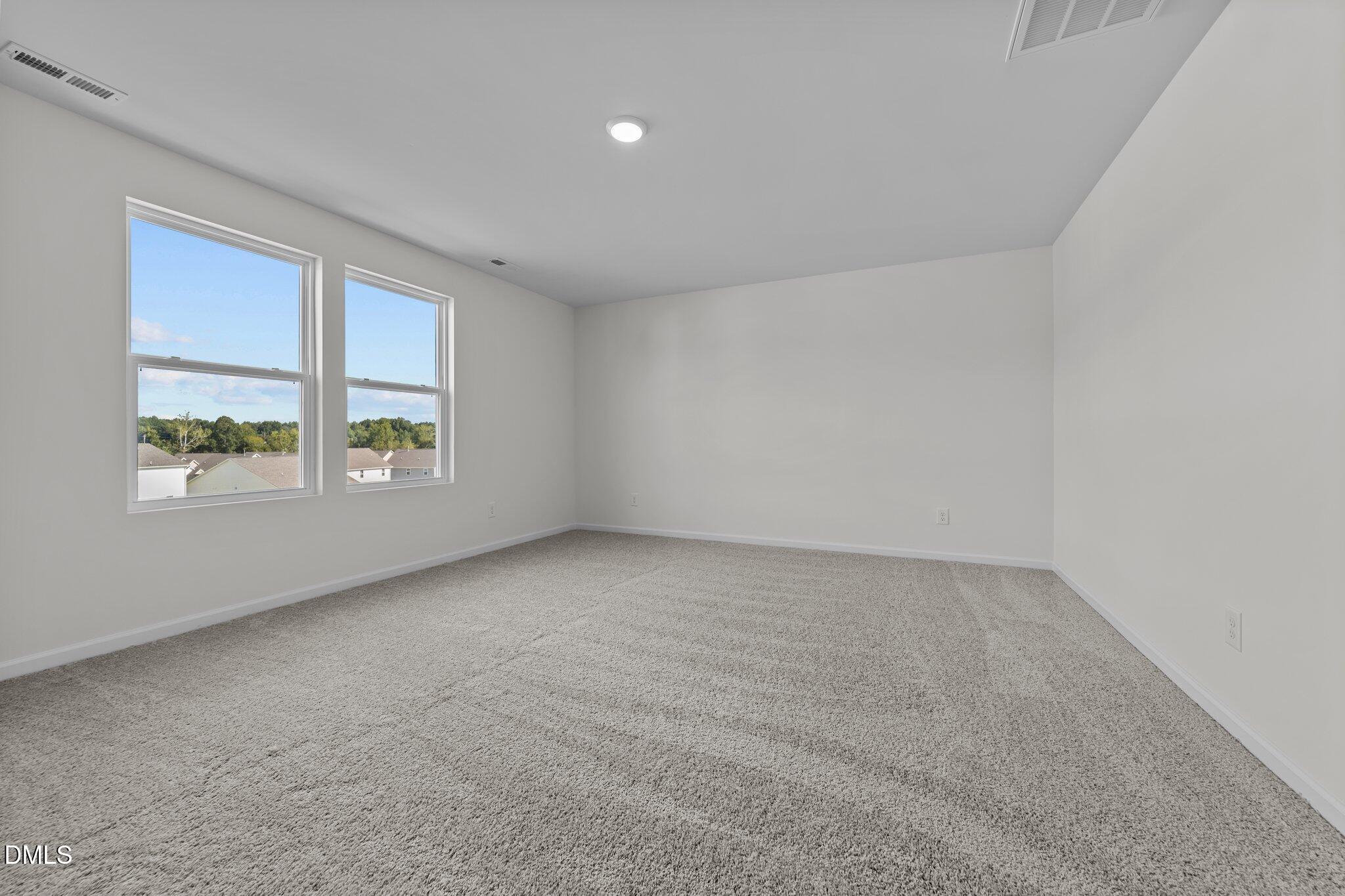 333 Shiloh Way Mebane, NC 27302 - Photo 22 of 35 an empty room with windows