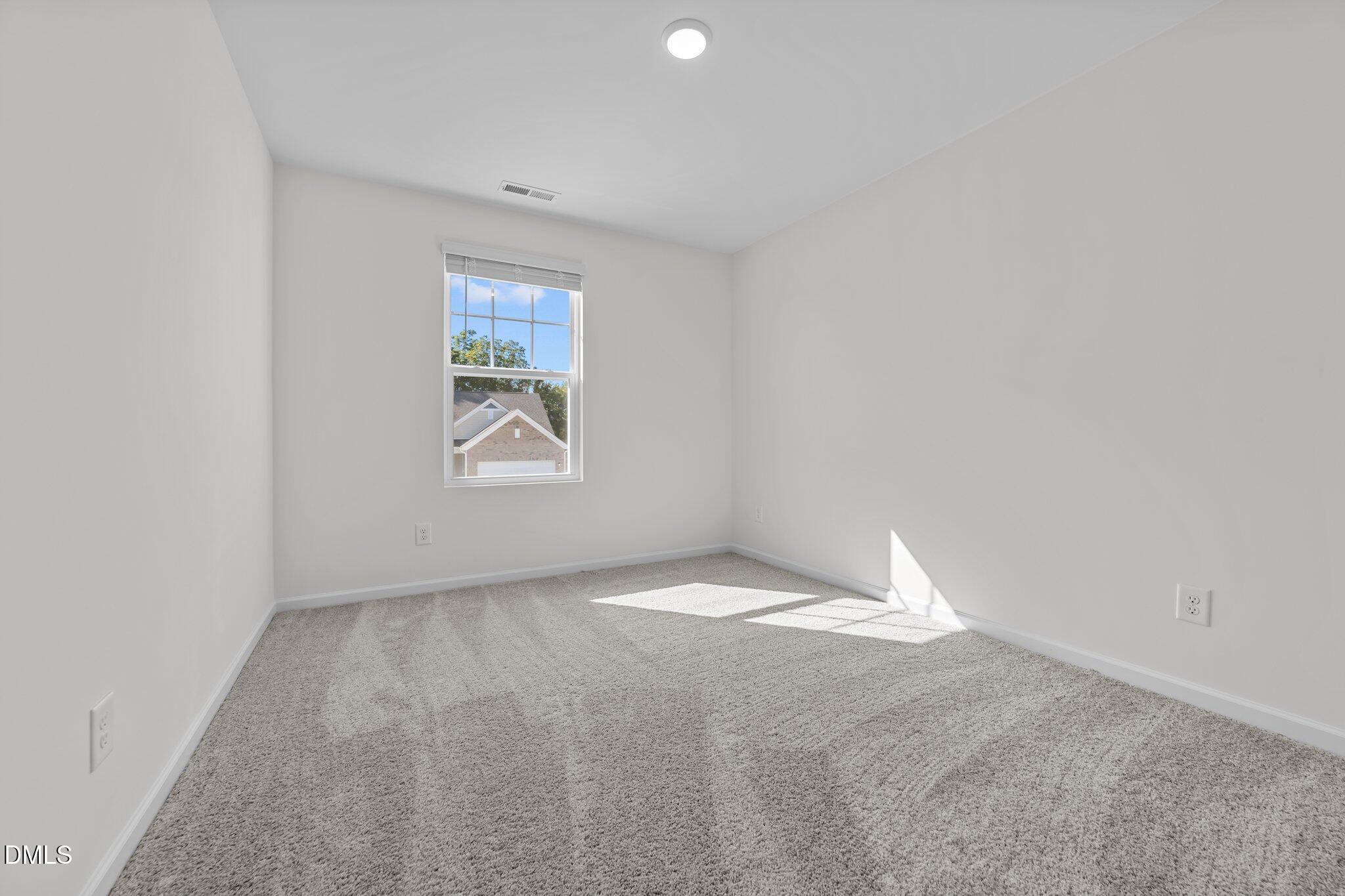 333 Shiloh Way Mebane, NC 27302 - Photo 31 of 35 a view of an empty room and a window