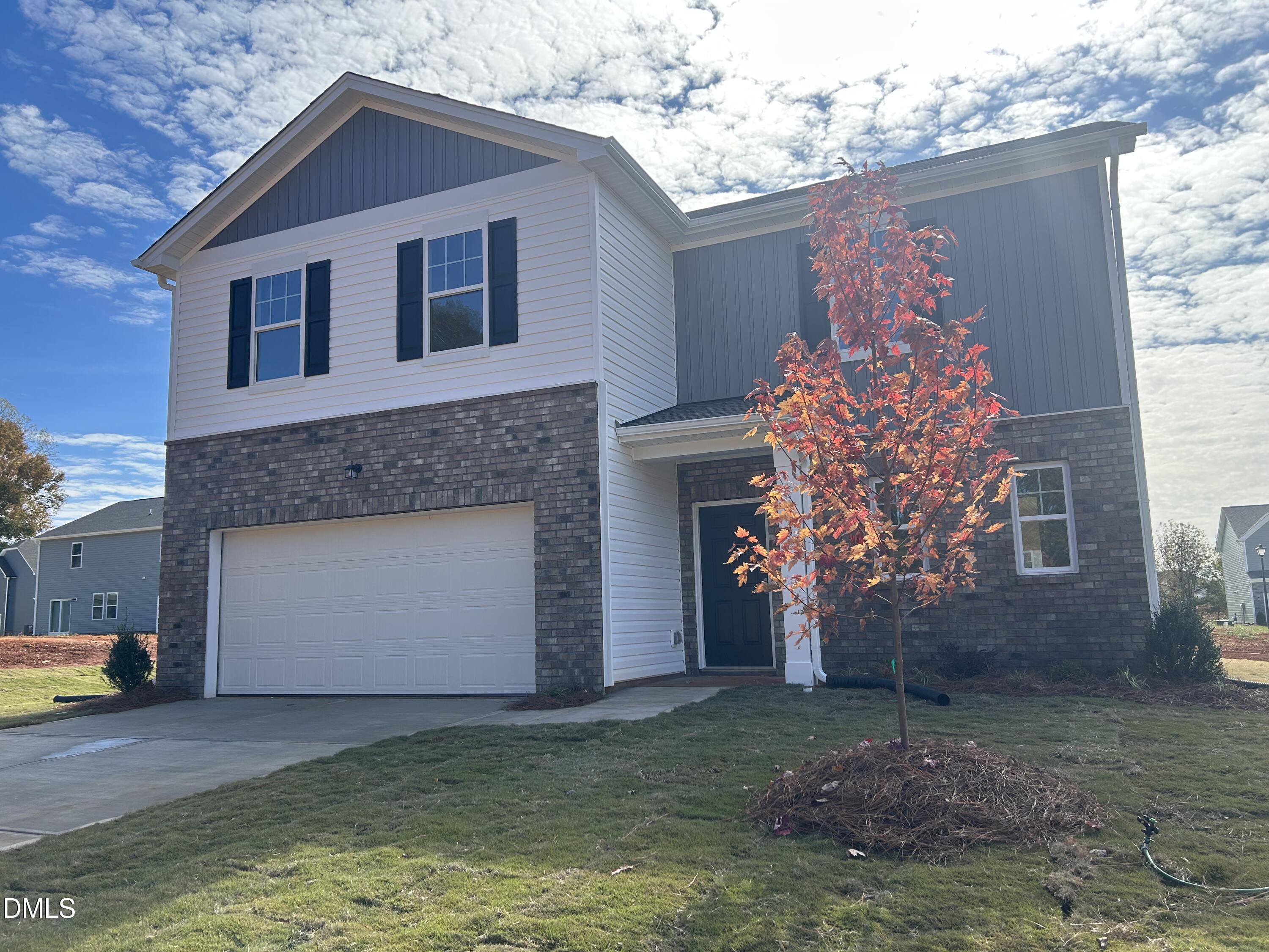 333 Shiloh Way Mebane, NC 27302 - Photo 3 of 35 a view of a house with a yard