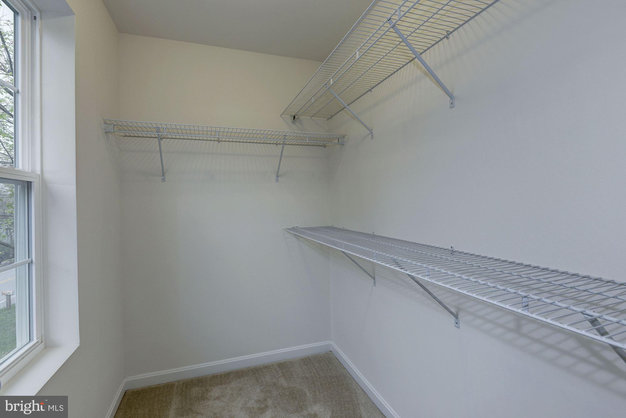 5 Cissell Avenue Laurel, MD 20723 - Photo 18 of 21 a view of a room with racks on the wall