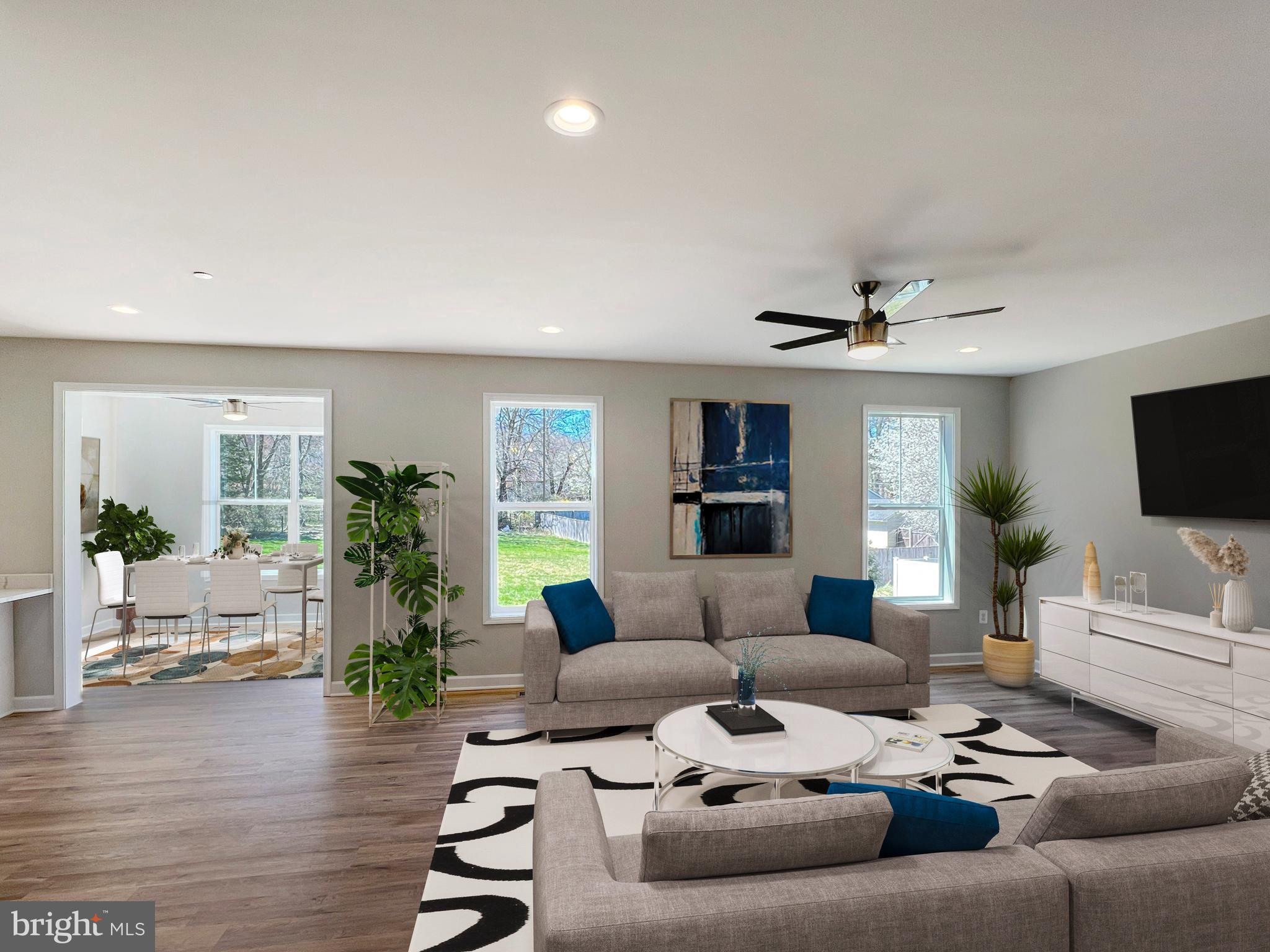 5 Cissell Avenue Laurel, MD 20723 - Photo 3 of 21 a living room with furniture and a flat screen tv