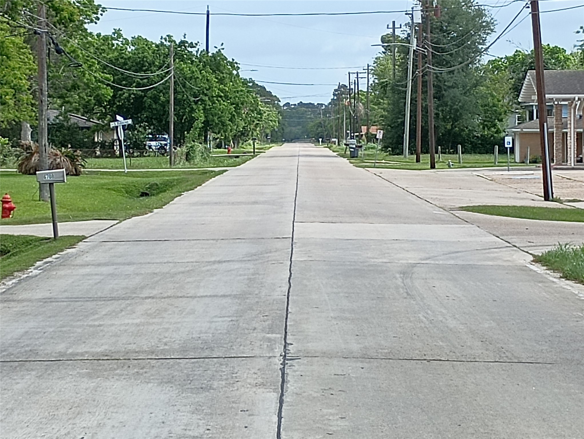 0 Fairwood Road Hitchcock, TX 77563 - Photo 4 of 7 The lot on Fairwood Road is in walking distance to the church on the right. Fairwood Road is a concrete road, well maintained in really good condition.