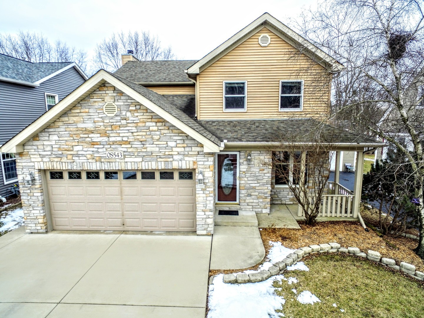 S543 Robbins Street Winfield, IL 60190 - Photo 1 of 17 a view of a house with wooden fence