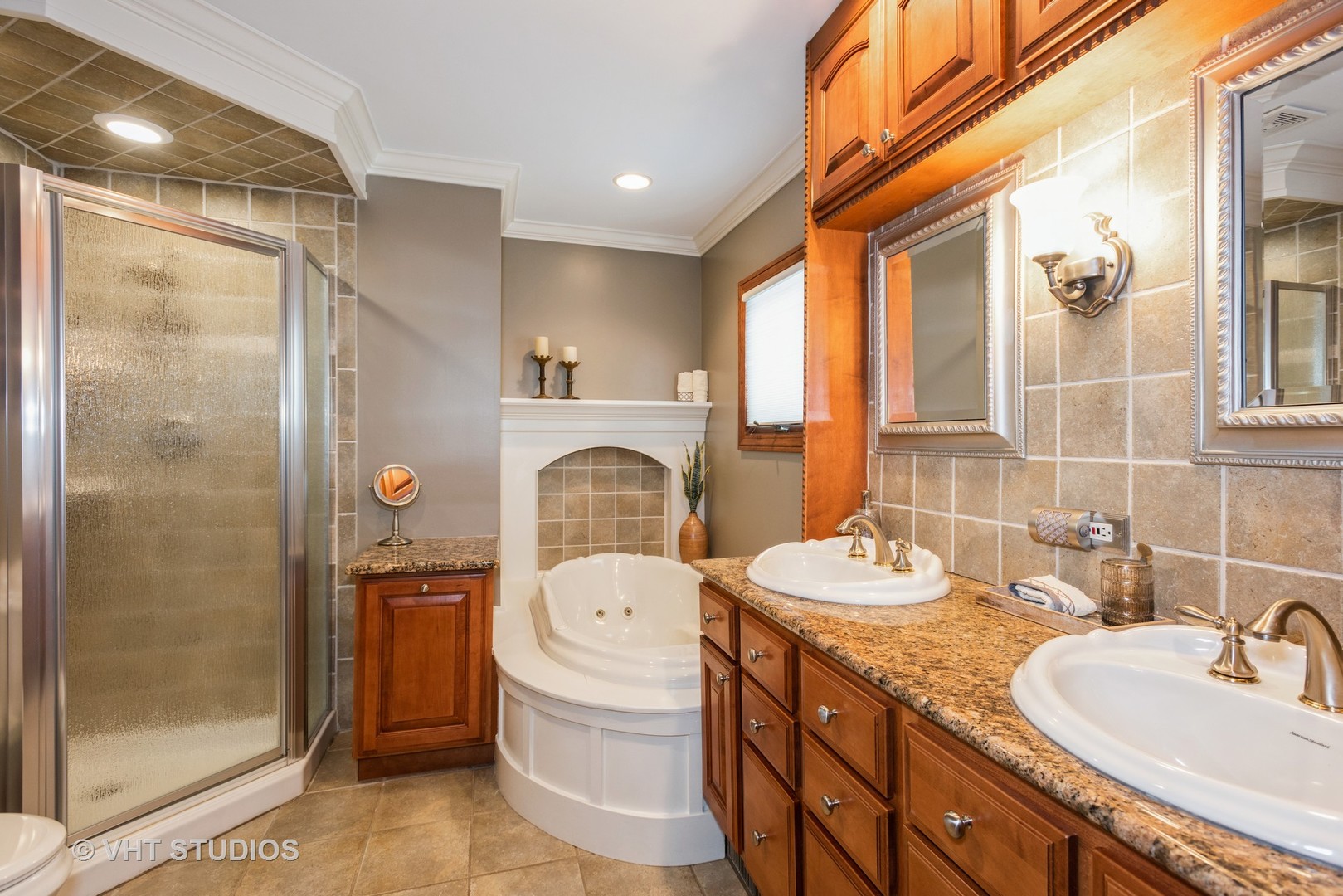 S543 Robbins Street Winfield, IL 60190 - Photo 12 of 17 a bathroom with a granite countertop sink a mirror a toilet and shower