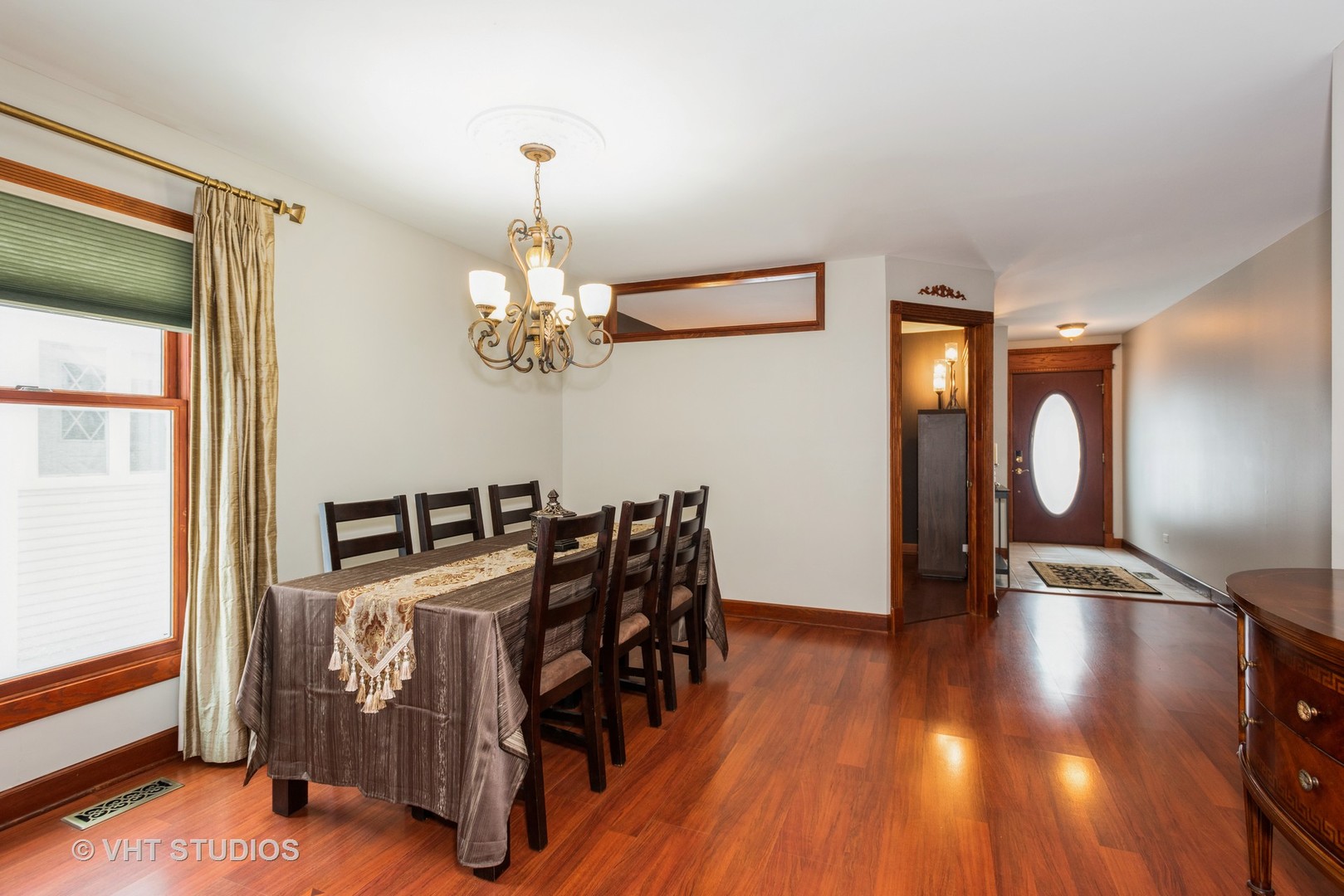 S543 Robbins Street Winfield, IL 60190 - Photo 4 of 17 a view of a dining room with furniture and wooden floor