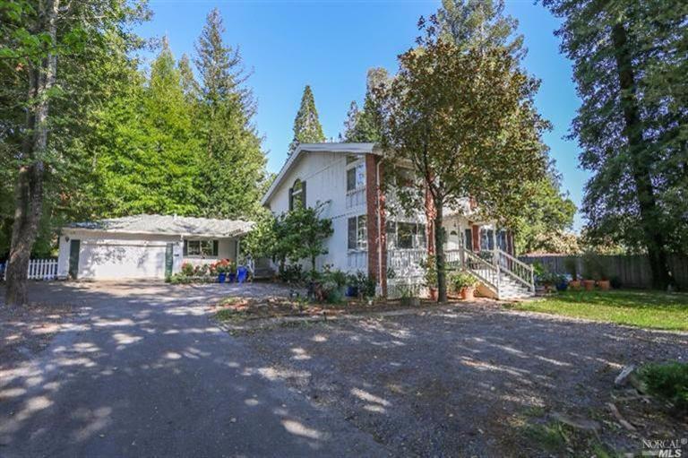 4115 Ross Road Sebastopol, CA 95472 - Photo 1 of 1 a view of a house with outdoor space and a tree