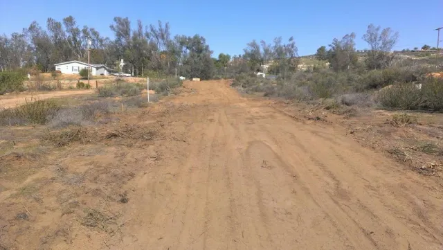 a view of a yard with mountain view