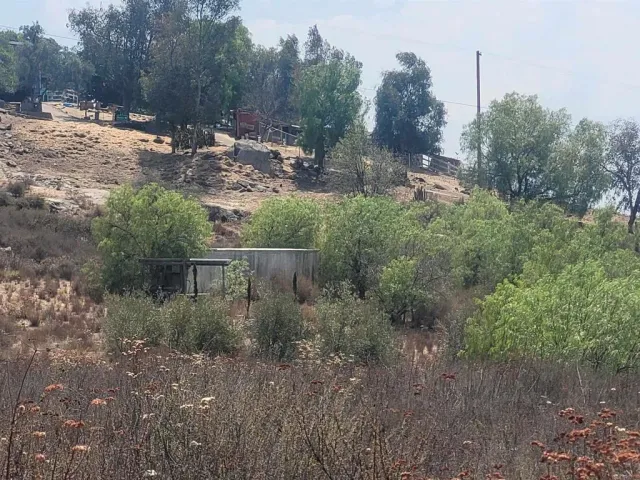 a view of a water fountain with an outdoor space