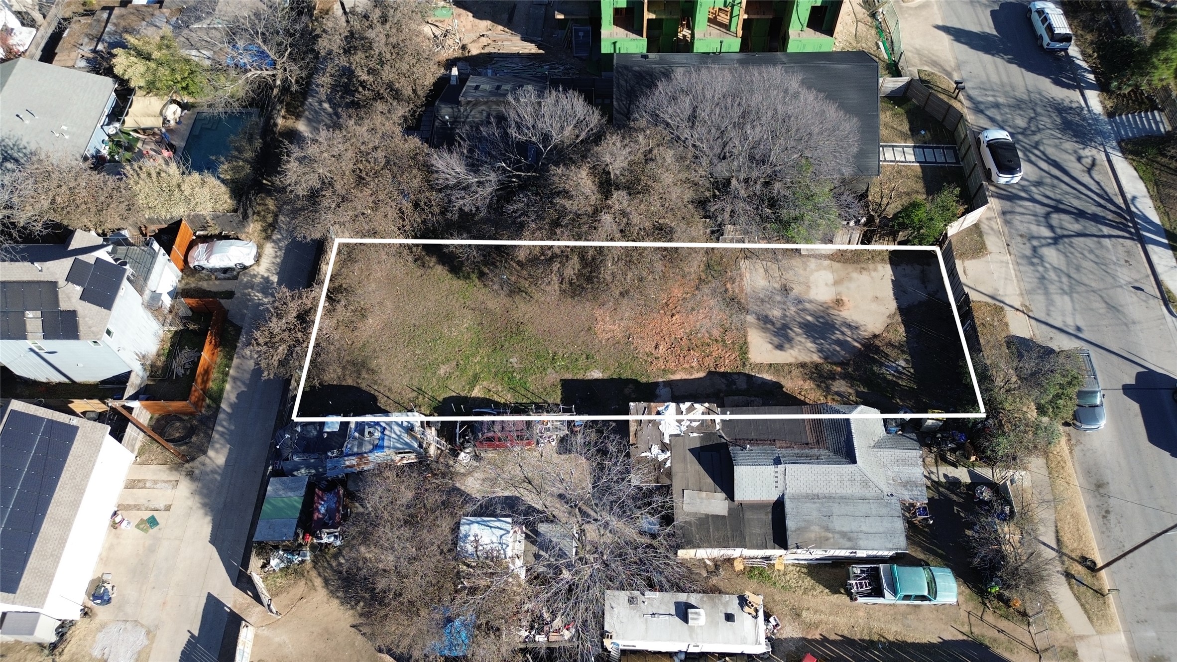 2806 East 3rd Street Austin, TX 78702 - Photo 8 of 13 an aerial view of house with parking
