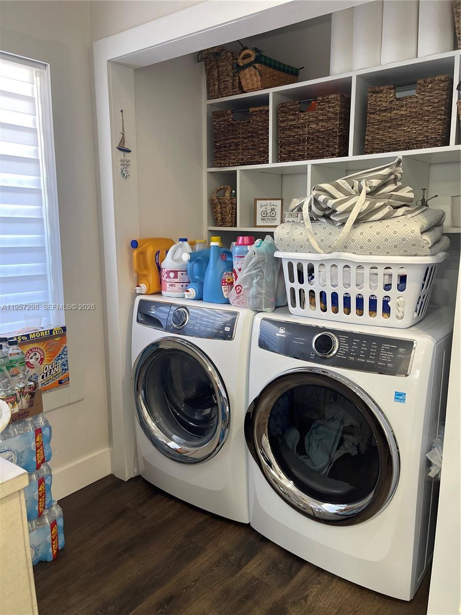 14200 Southwest 160th Court Miami, FL 33196 - Photo 13 of 36 a utility room with dryer and washer