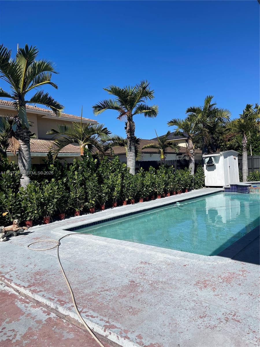 14200 Southwest 160th Court Miami, FL 33196 - Photo 31 of 36 a view of a backyard