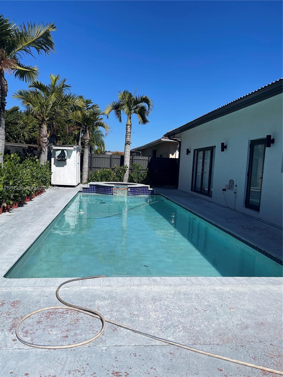14200 Southwest 160th Court Miami, FL 33196 - Photo 34 of 36 a view of a porch in front of house