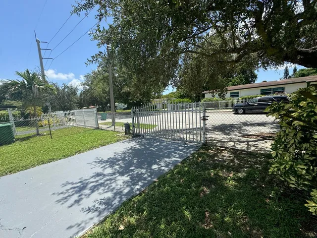 a view of a backyard with a garden