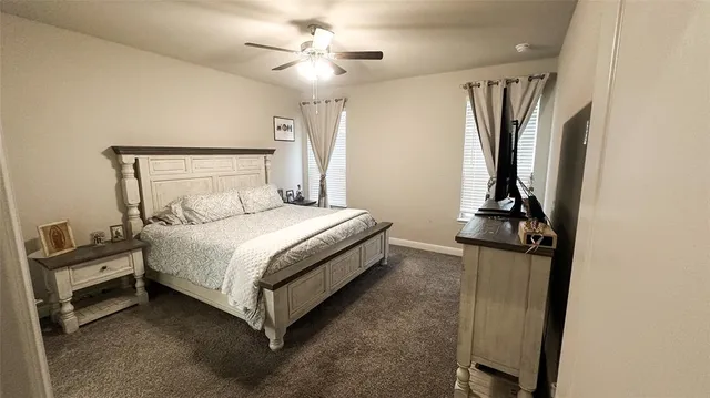 a bathroom with a sink a mirror and a shower