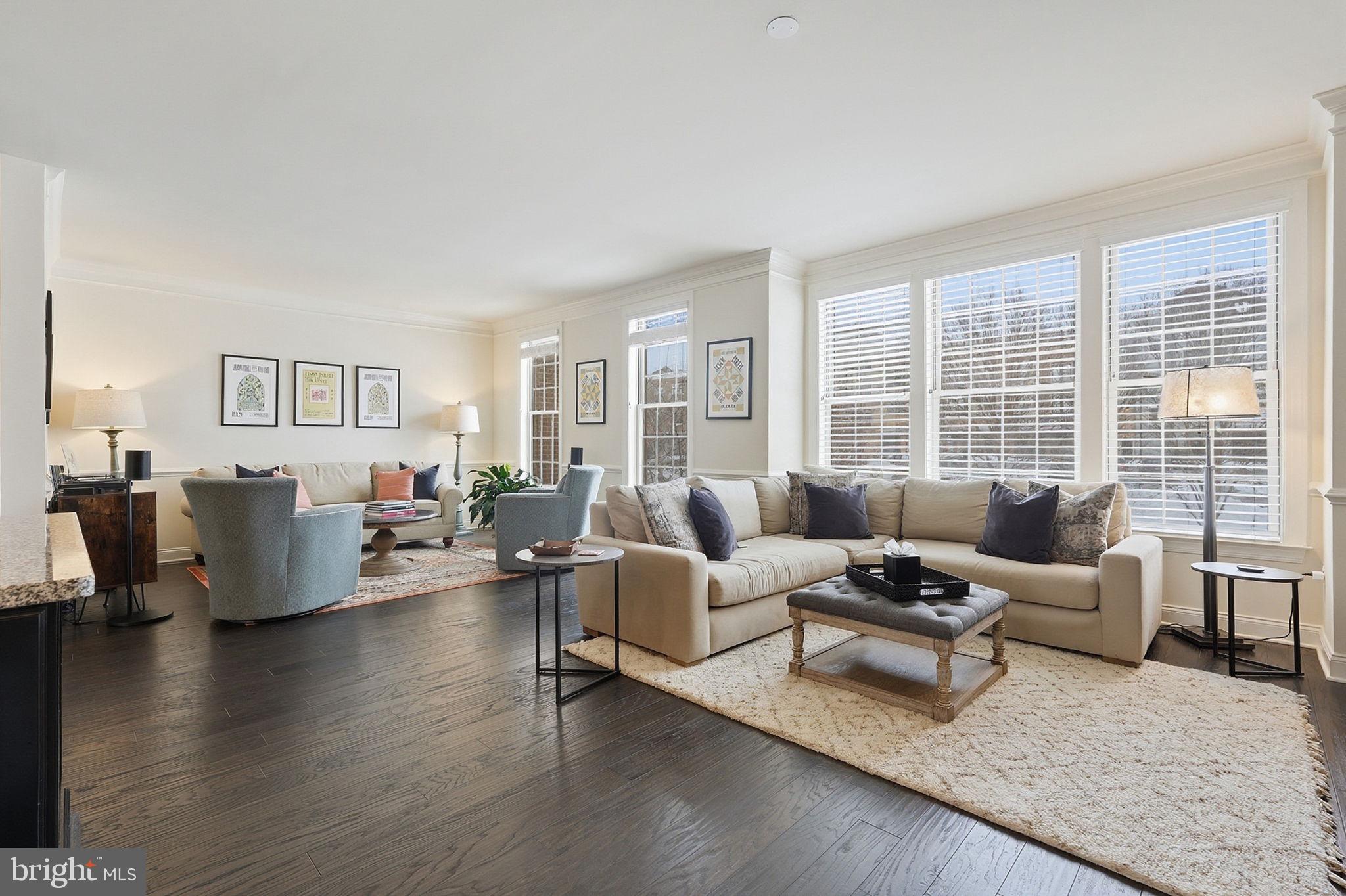 22597 Windsor Locks Square Ashburn, VA 20148 - Photo 12 of 44 a living room with furniture wooden floor and a large window