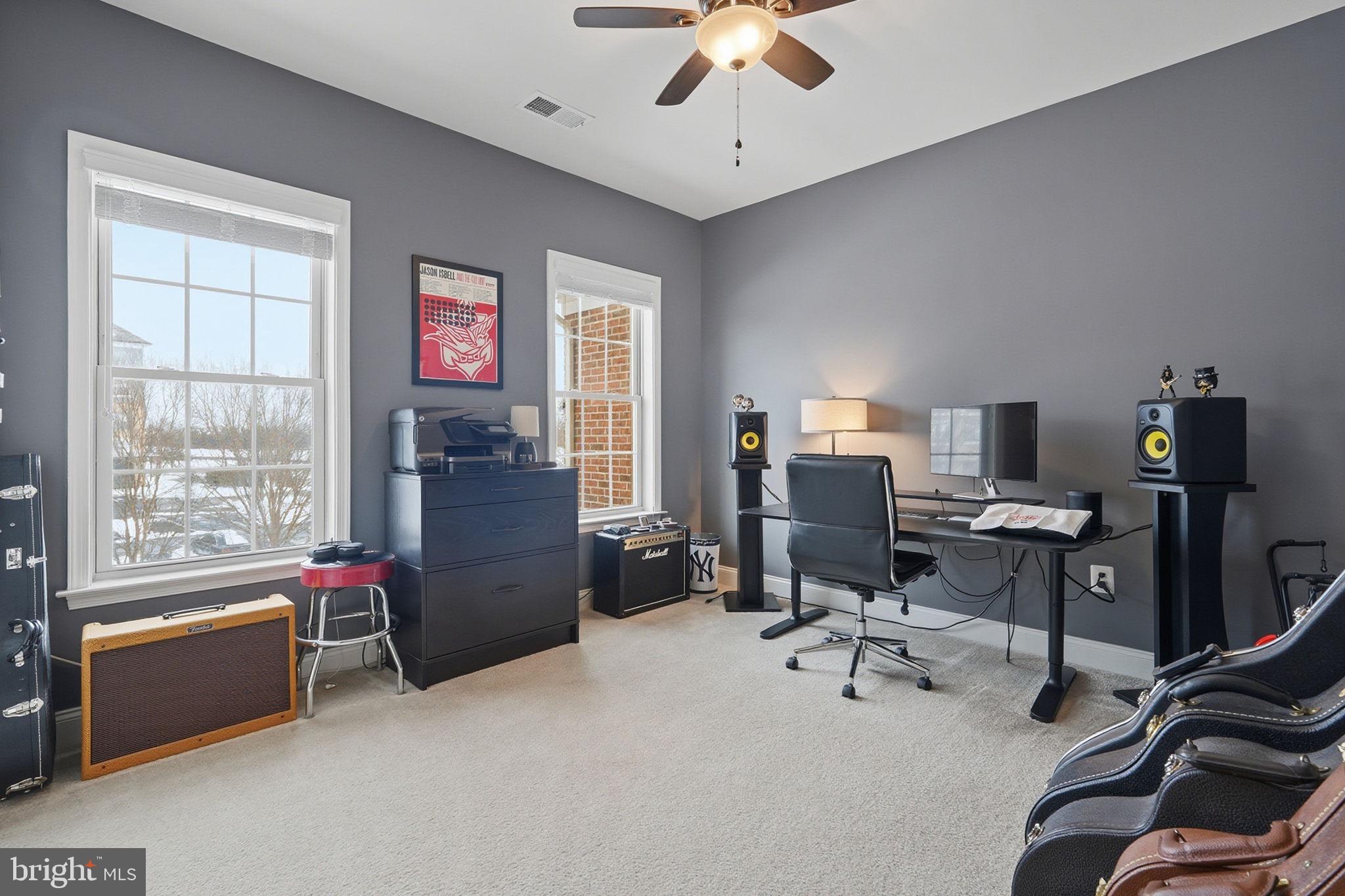 22597 Windsor Locks Square Ashburn, VA 20148 - Photo 16 of 44 a view of a workspace with furniture and a window