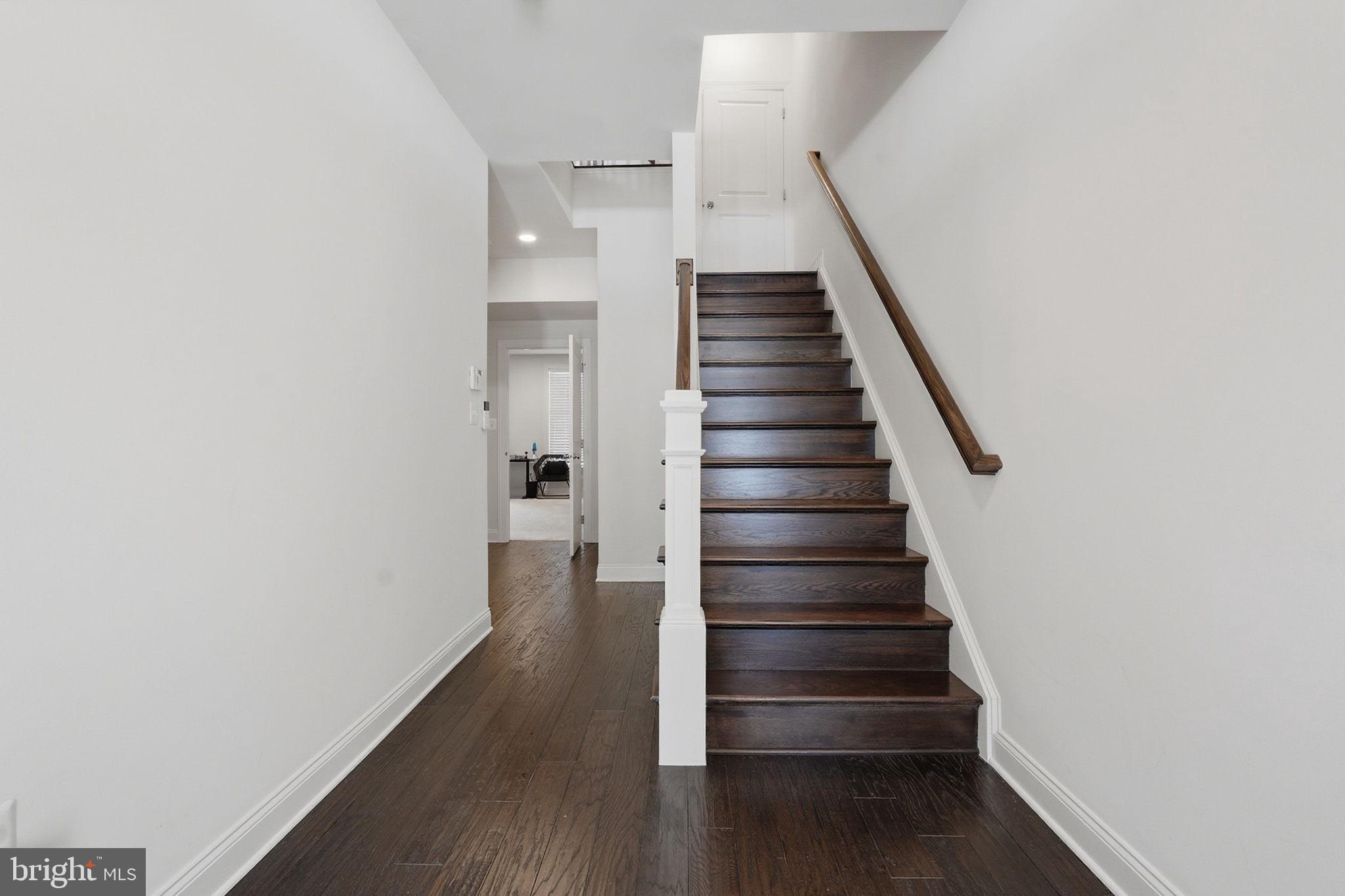 22597 Windsor Locks Square Ashburn, VA 20148 - Photo 17 of 44 a view of entryway with wooden floor