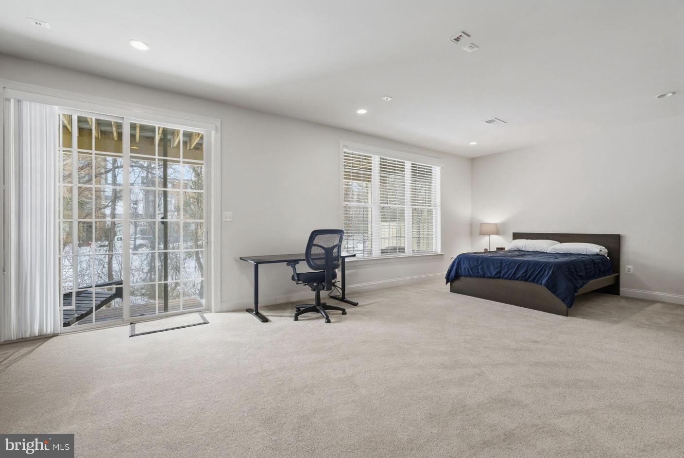 22597 Windsor Locks Square Ashburn, VA 20148 - Photo 20 of 44 a living room with furniture and a large window