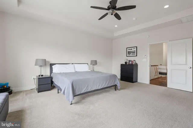 a bedroom with a bed and closet