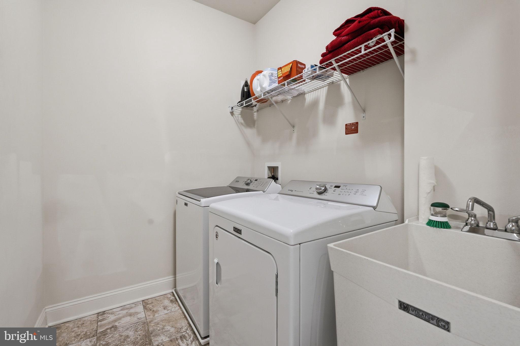 22597 Windsor Locks Square Ashburn, VA 20148 - Photo 34 of 44 a utility room with dryer and washer