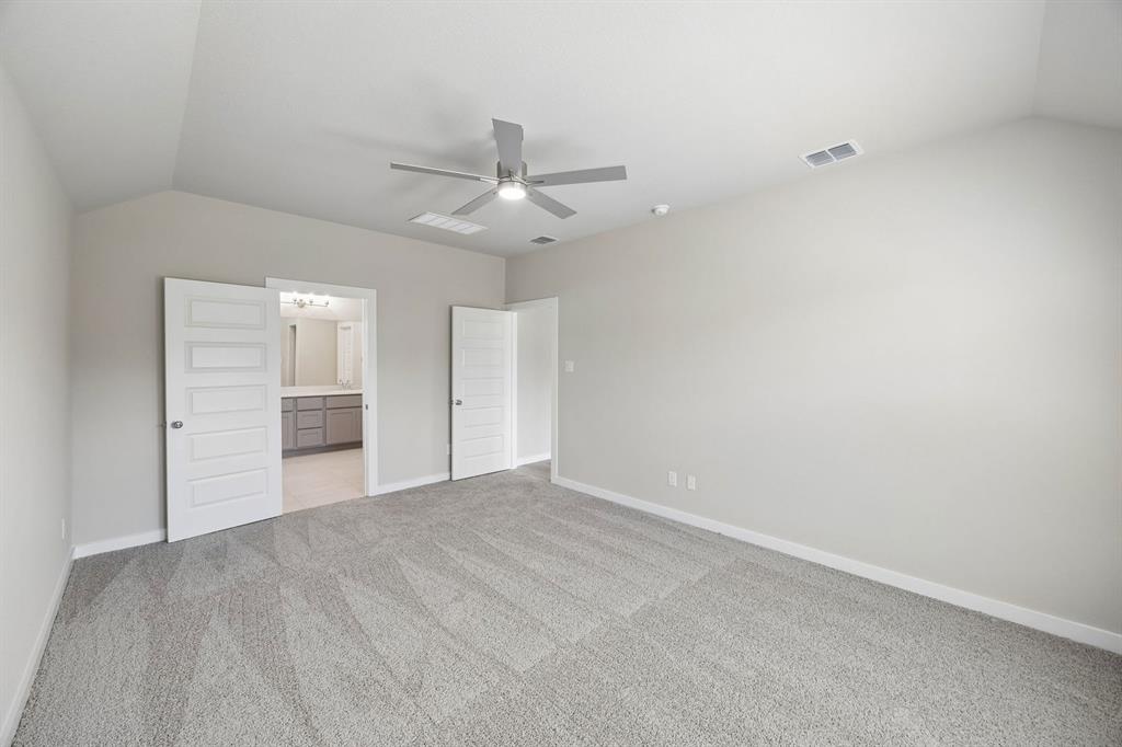 1424 Companero Street Haslet, TX 76052 - Photo 15 of 33 an empty room with closet and windows