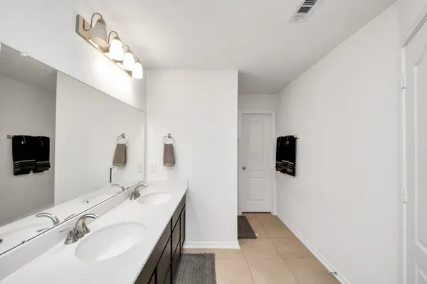 a kitchen with a stove and a microwave