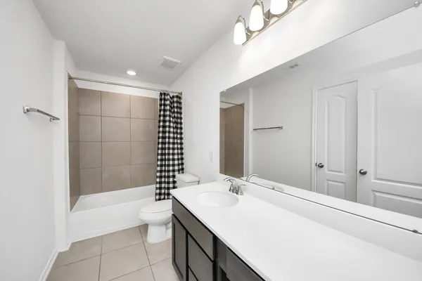 a view of yard with swimming pool and green space