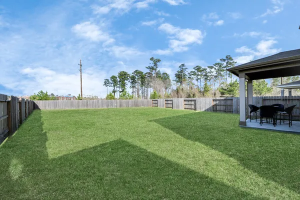 a view of a backyard with a garden