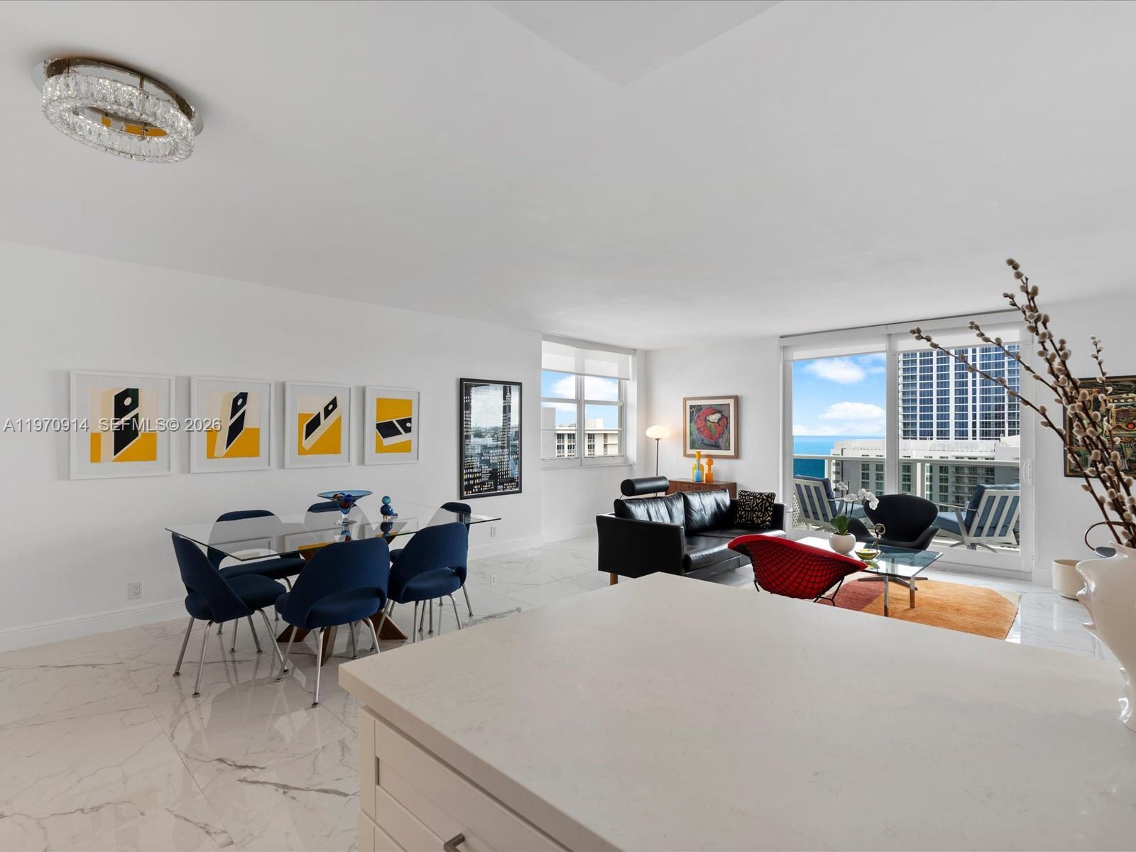 336 North Birch Road, Unit PH Fort Lauderdale, FL 33304 - Photo 15 of 68 a living room with furniture chess board and a window