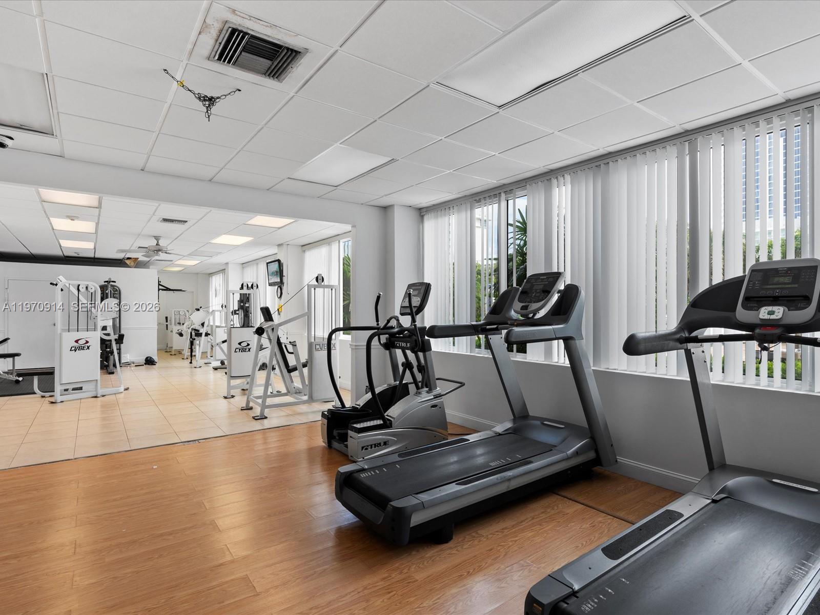 336 North Birch Road, Unit PH Fort Lauderdale, FL 33304 - Photo 35 of 68 a view of a room with gym equipment