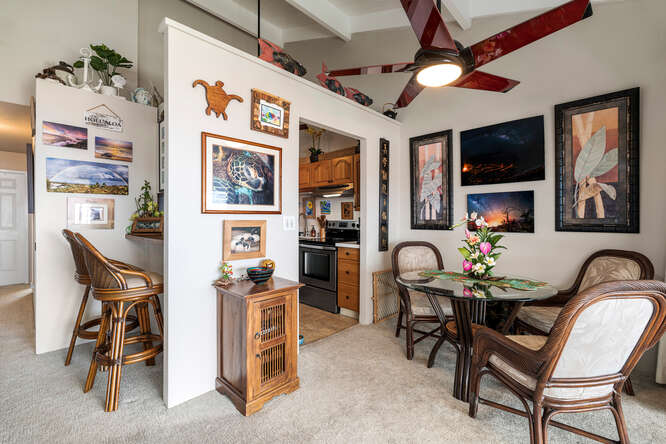 79-7199 Kona Coffee Villas, Unit 315 Holualoa, HI 96725 - Photo 12 of 28 a dining room with furniture and window