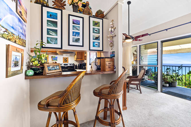 79-7199 Kona Coffee Villas, Unit 315 Holualoa, HI 96725 - Photo 13 of 28 a view of a patio with table and chairs