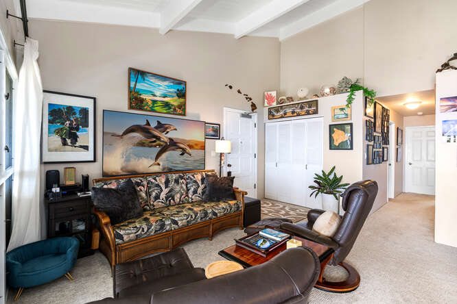79-7199 Kona Coffee Villas, Unit 315 Holualoa, HI 96725 - Photo 5 of 28 a living room with furniture and wooden floor