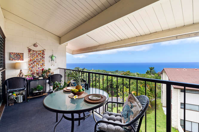 79-7199 Kona Coffee Villas, Unit 315 Holualoa, HI 96725 - Photo 6 of 28 a balcony with furniture and a potted plant