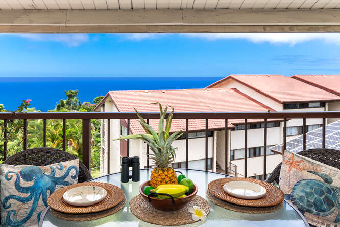 79-7199 Kona Coffee Villas, Unit 315 Holualoa, HI 96725 - Photo 7 of 28 a front view of a house with garden and outdoor seating